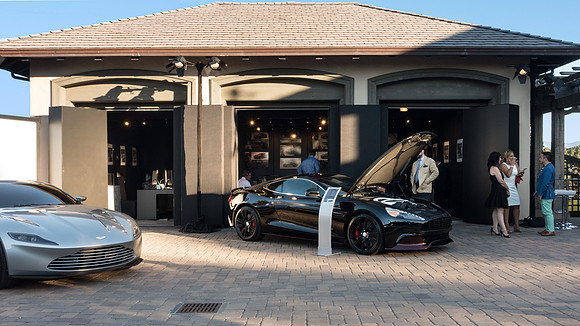 Auto court full of Aston Martin autos