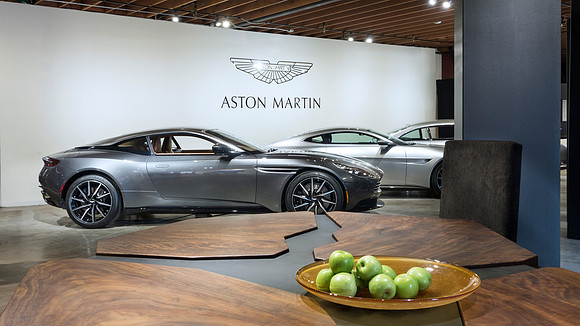 Five rivers table and Aston Martins