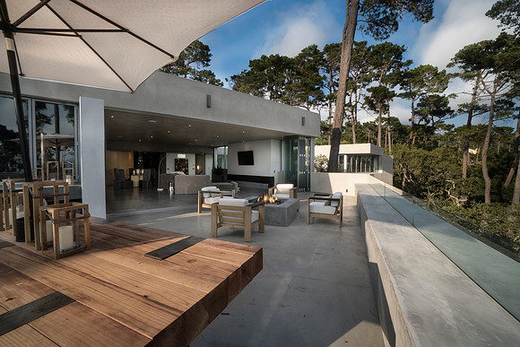 view of exterior deck and firepit