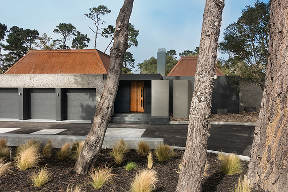 Front of residence with curved driveway