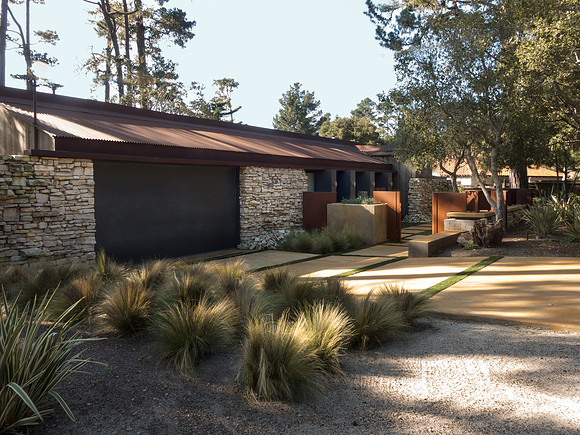 View of exterior with Carmel stacked stone walls